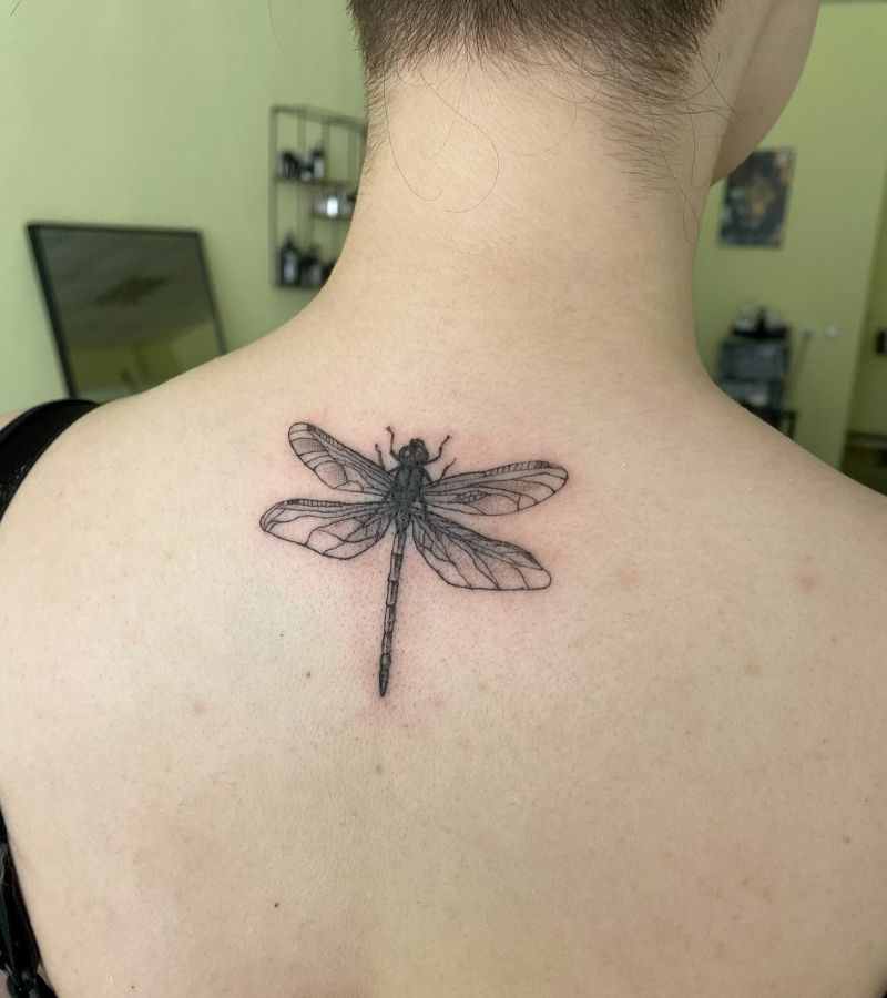 black-dragonfly-tattoo-at-back