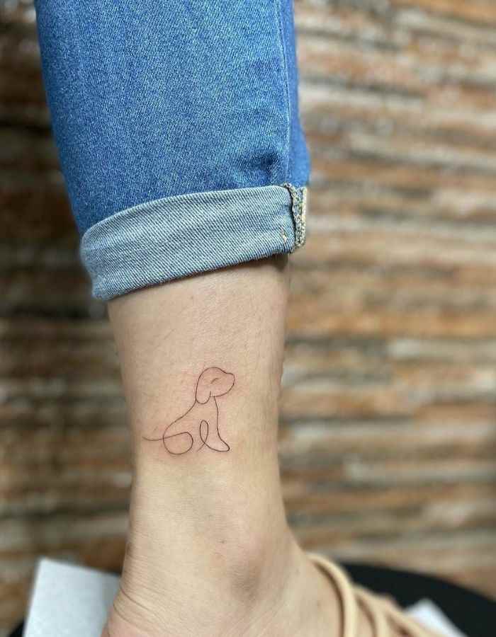 minimalist-dog-tattoo-fine-line-tattoo