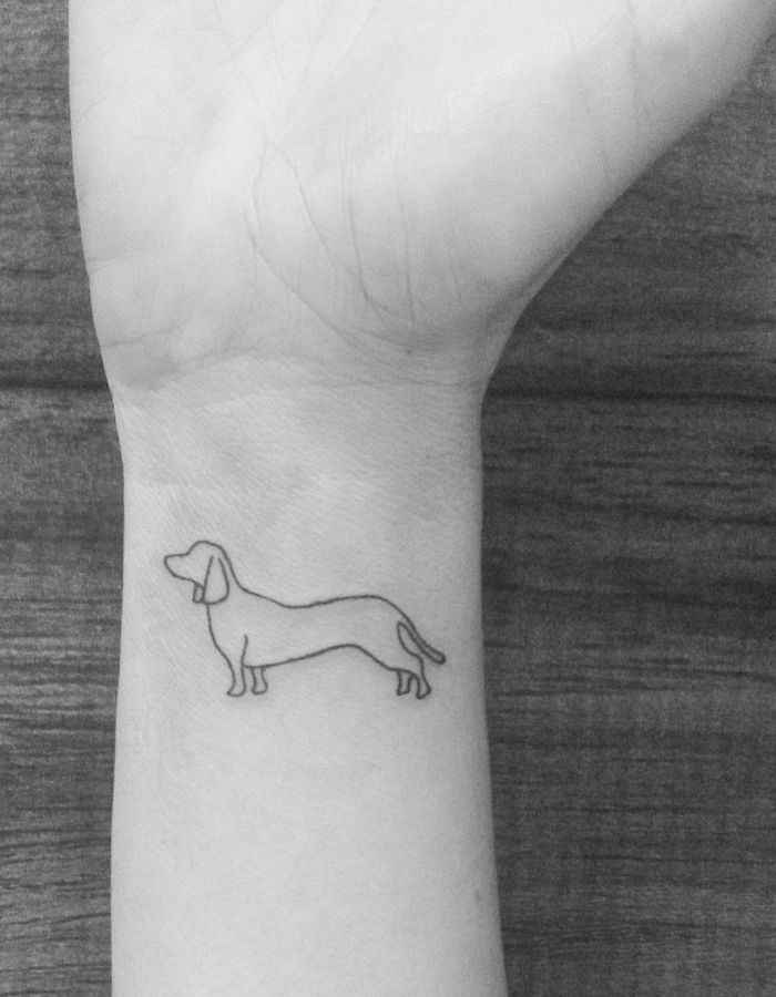 minimalist-dog-tattoo-on-wrist