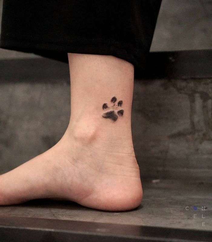 minimalistic-dog-paw-print-tattoo