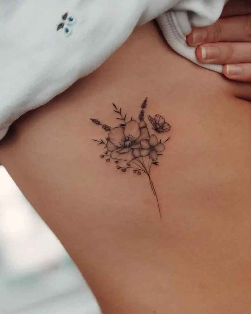 Wildflower Bouquet with Butterfly Ribcage Tattoo