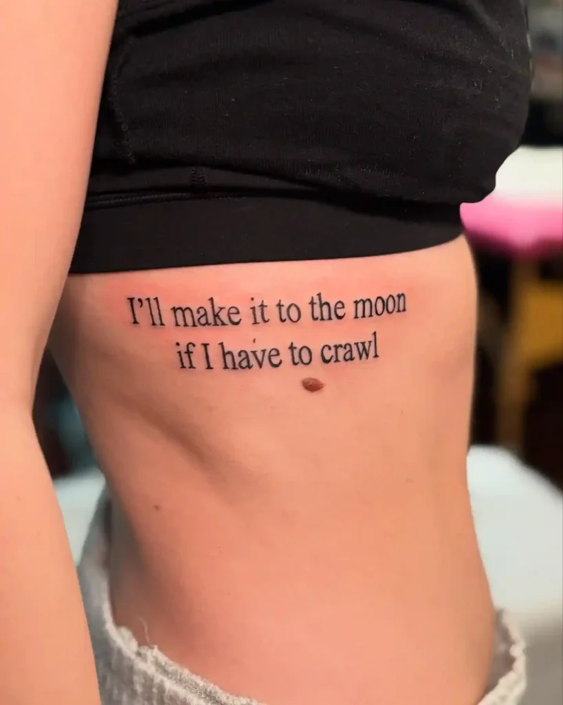 “I’ll Make It to the Moon…” Rib Script Tattoo