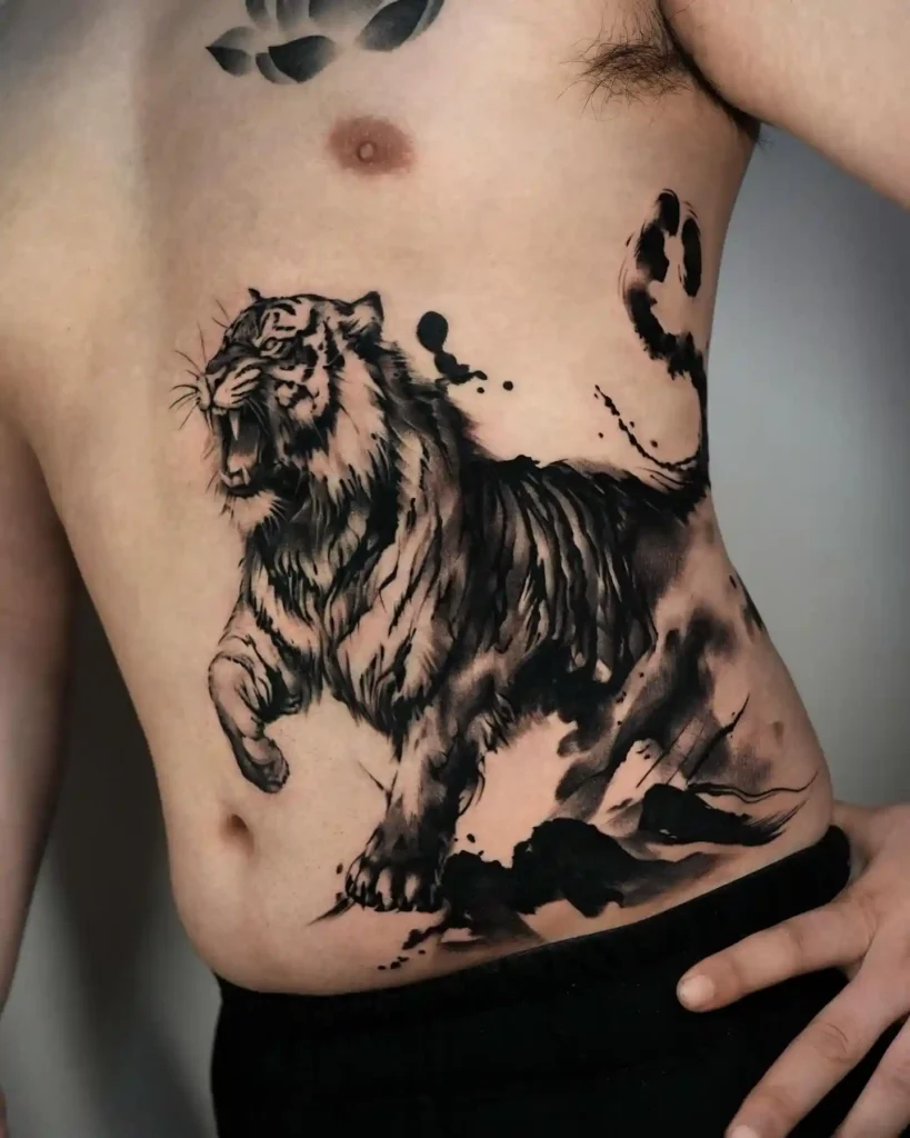 Roaring Tiger Ink Splash Ribcage Tattoo