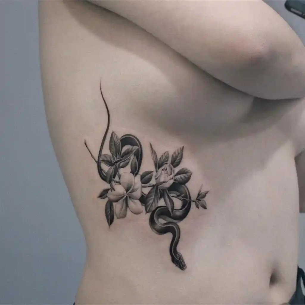Snake and Floral Ribcage Tattoo
