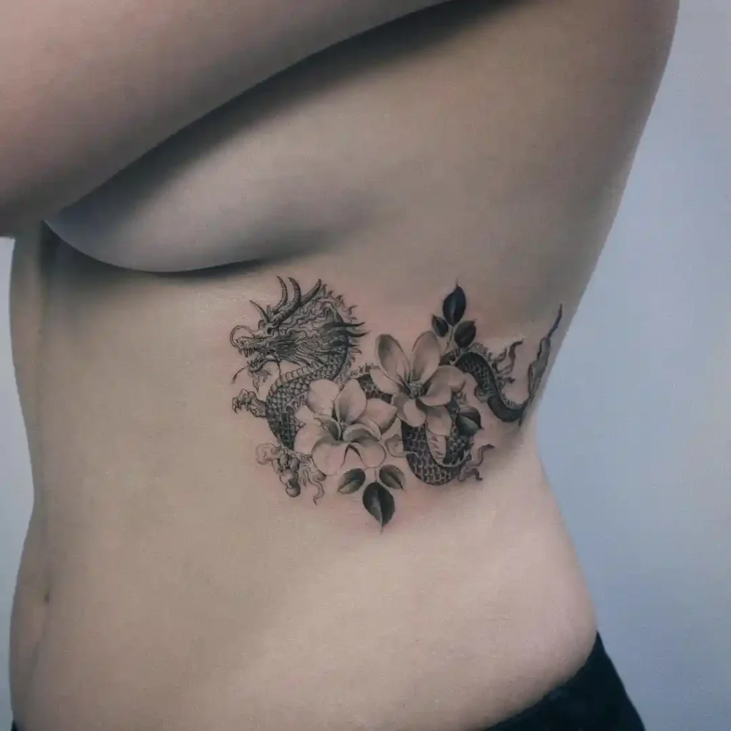 Dragon and Cherry Blossom Rib Tattoo