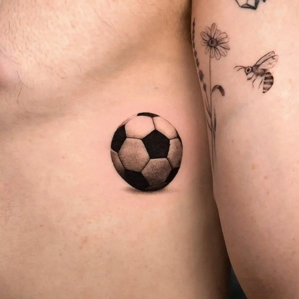 Soccer Ball Rib Tattoo