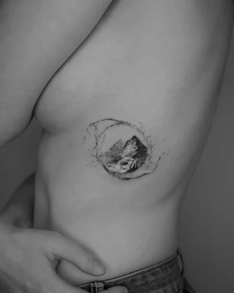Mountain in Water Splashed Frame Rib Tattoo