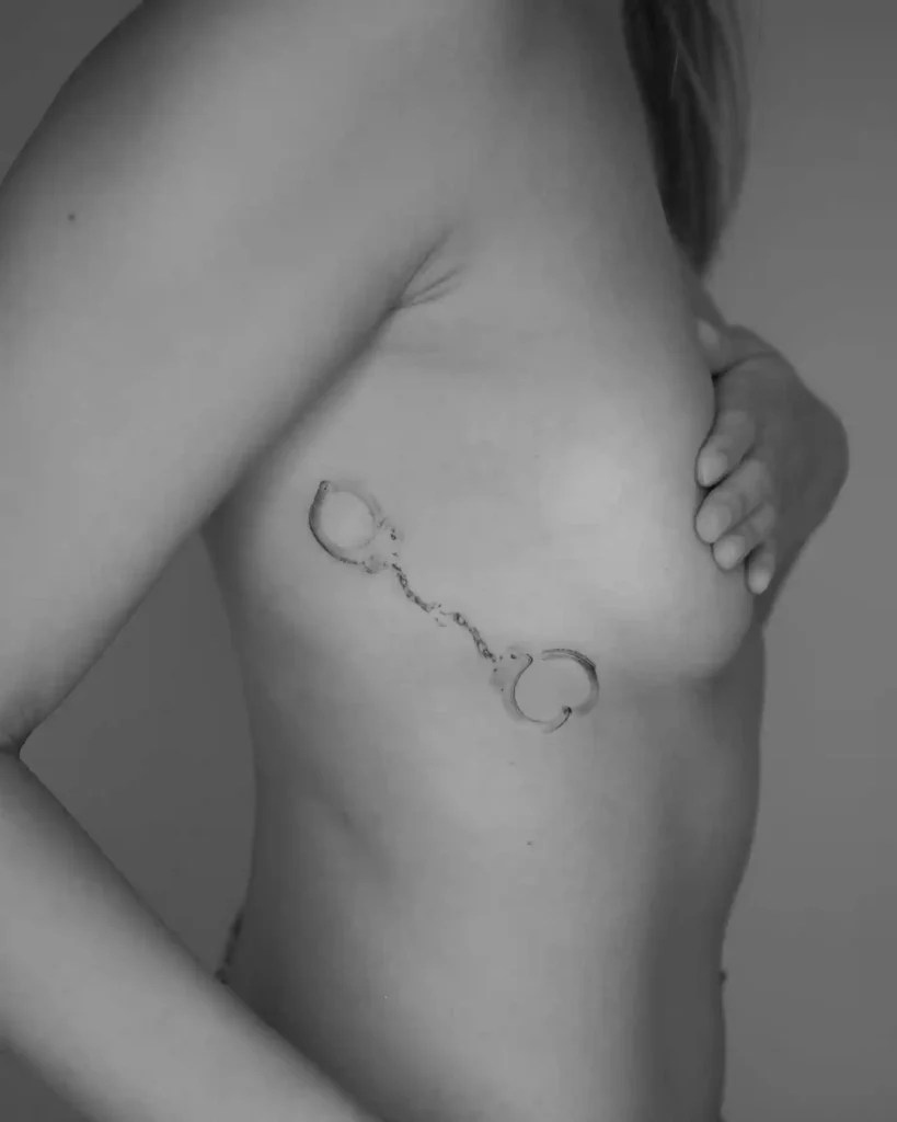 Handcuff Chain Rib Tattoo