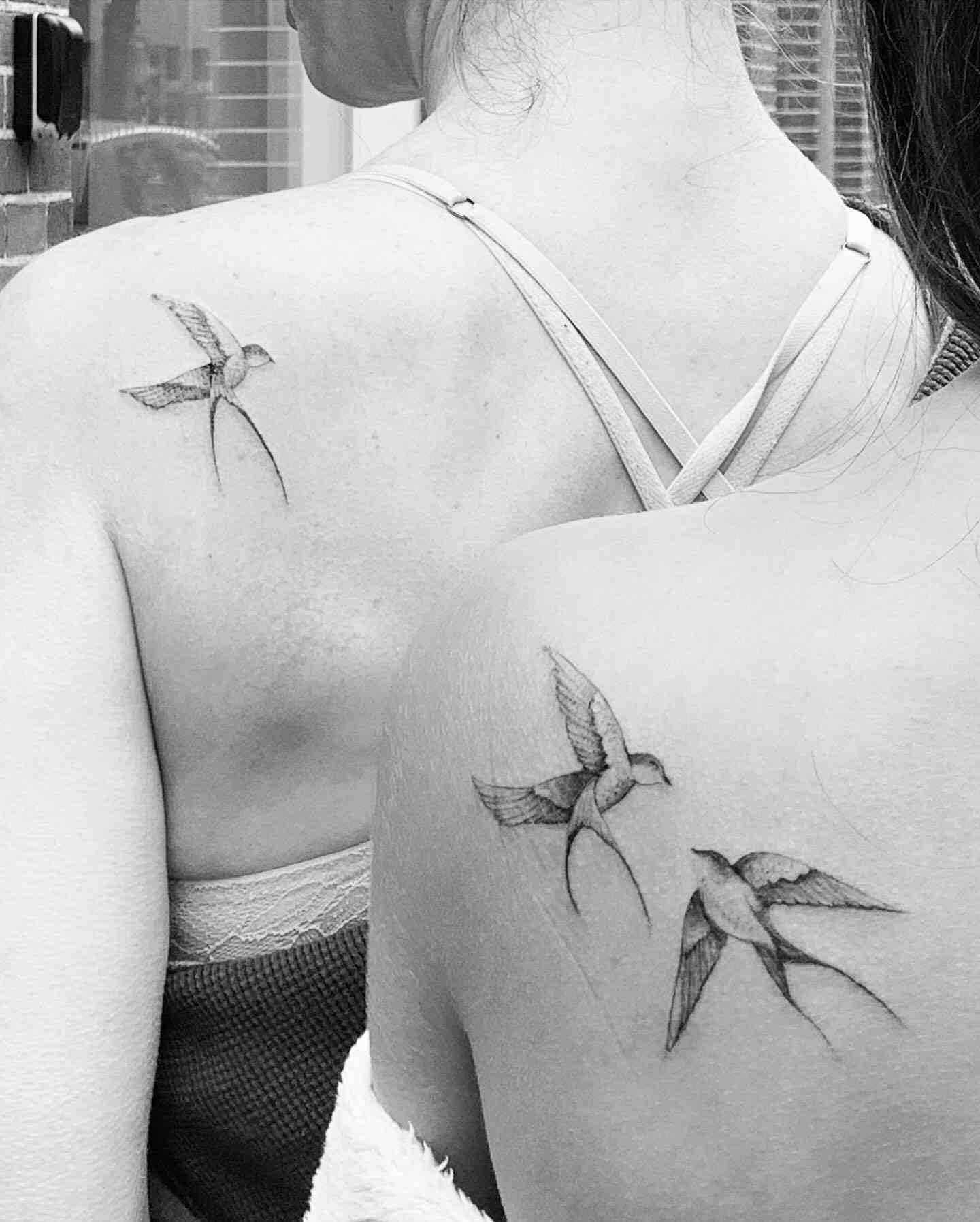 hummingbird inspired matching mother daughter tattoo on shoulder