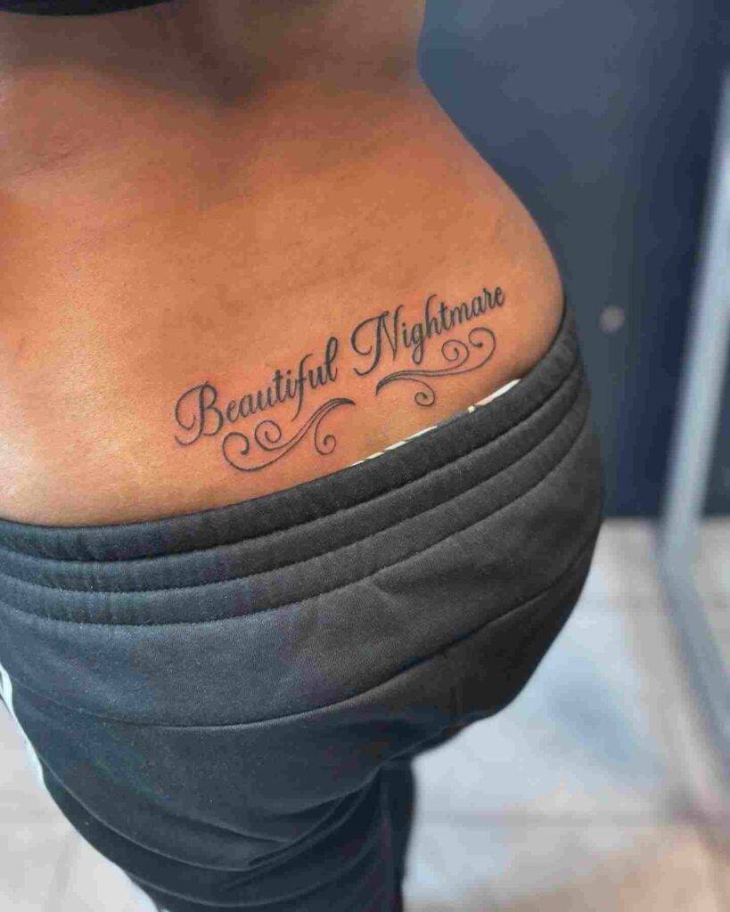 lower-back-word-tattoo-for-women-7
