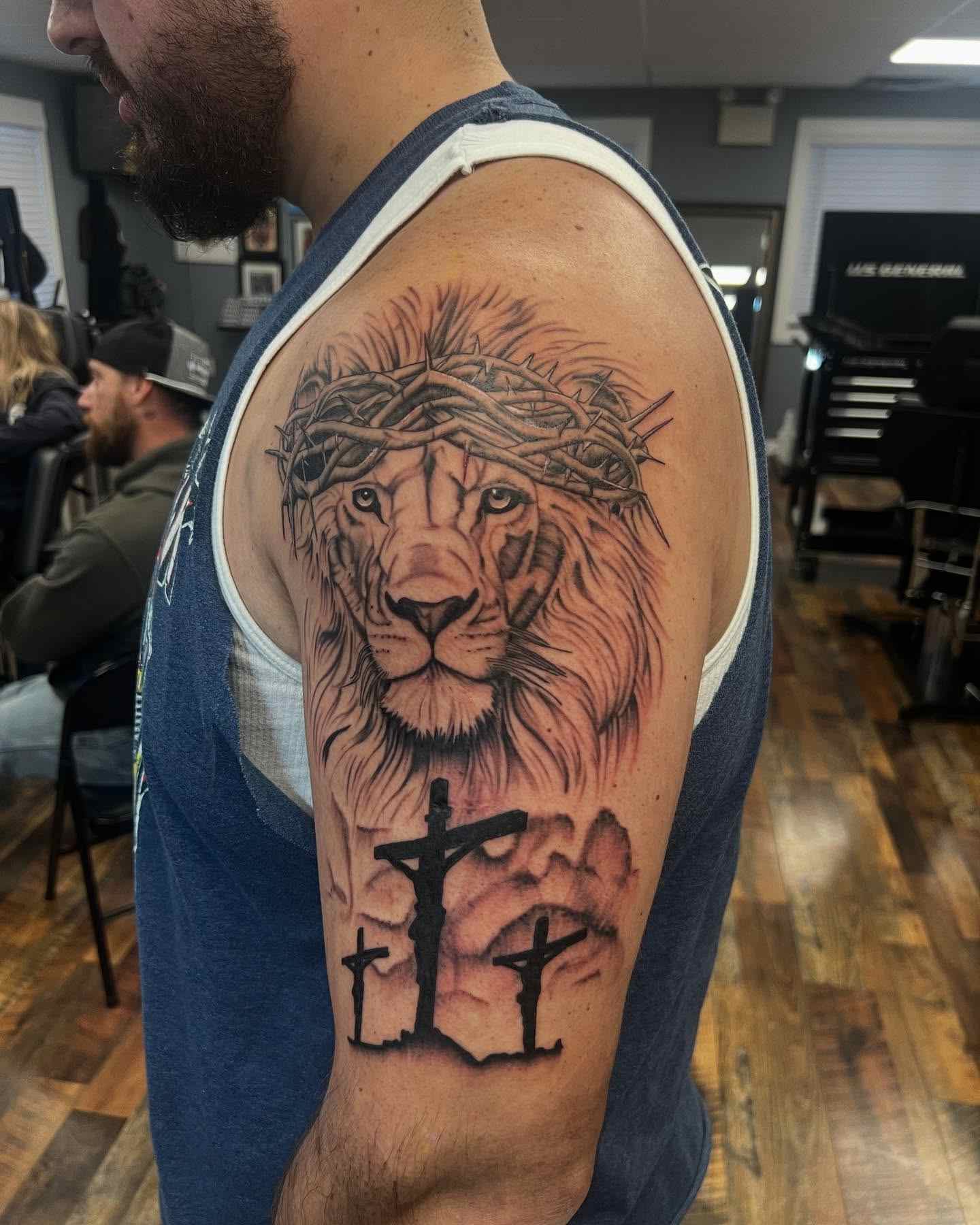 cross-lion-tattoo-designs-for-men