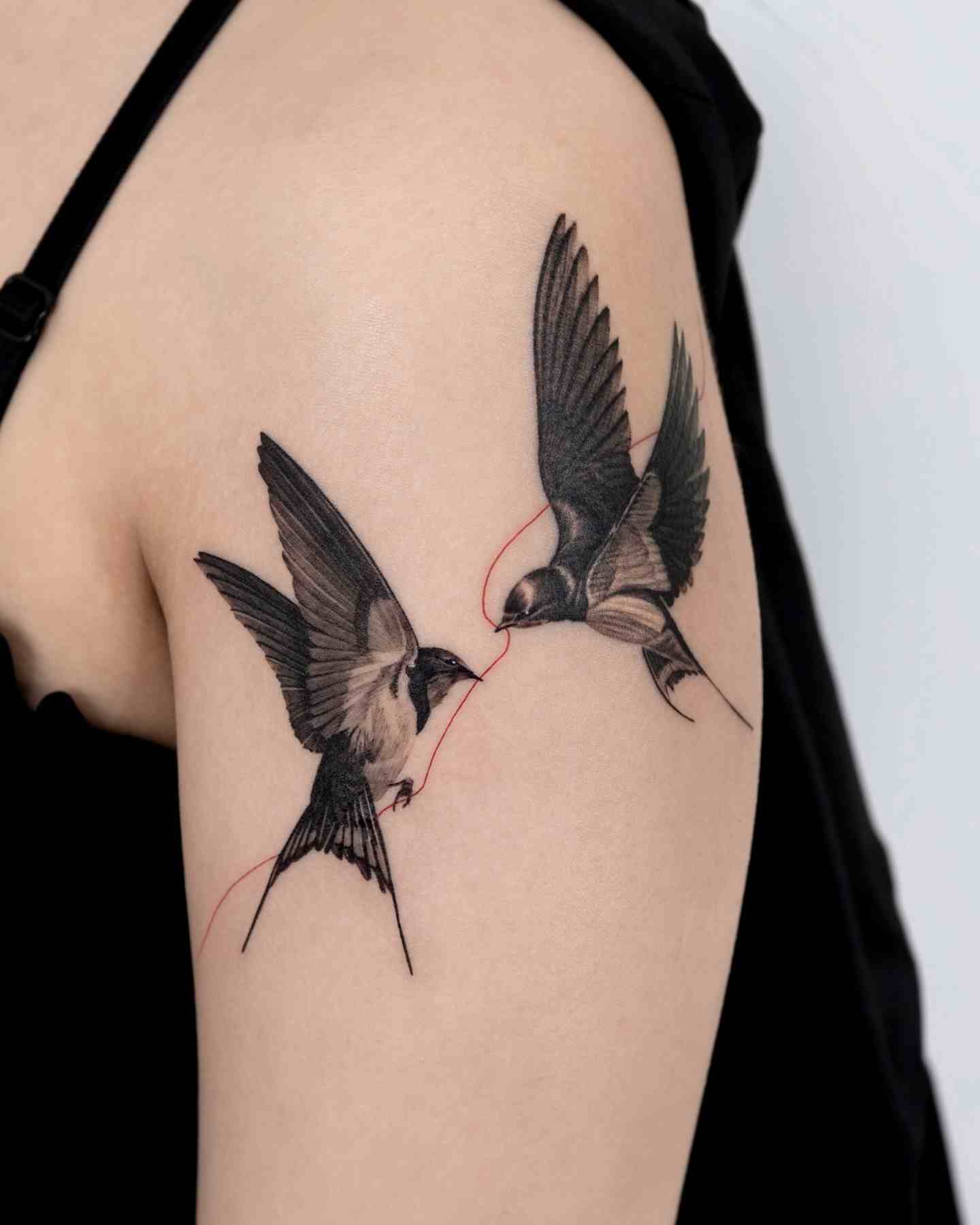 swallow-tattoo-ideas-for-women-upper-arm