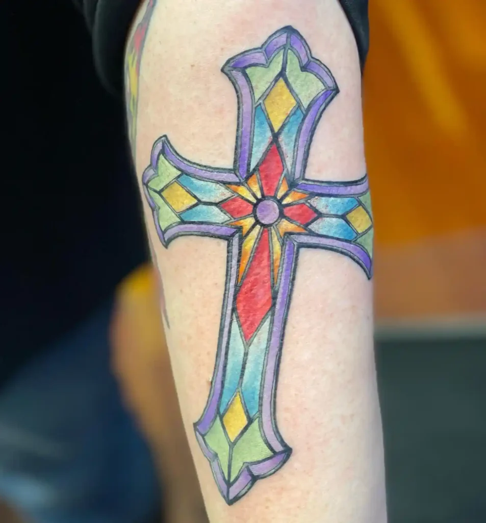 Stained Glass Cross Tattoo on Upper Arm