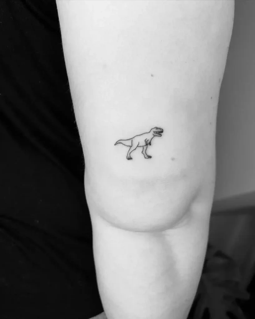 Micro T-Rex Line Tattoo