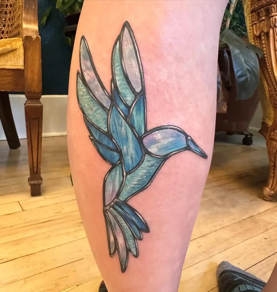 Blue Stained Glass Hummingbird Tattoo