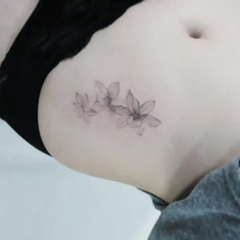 december birth flower tattoo