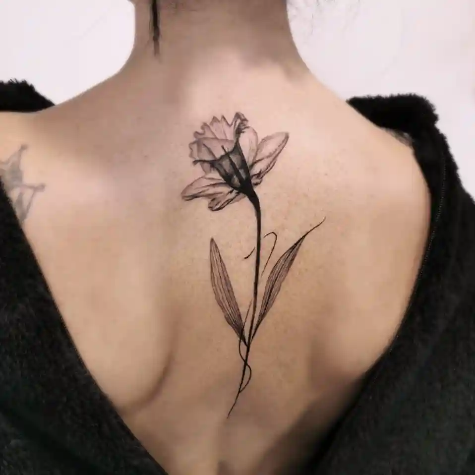 december birth flower tattoo