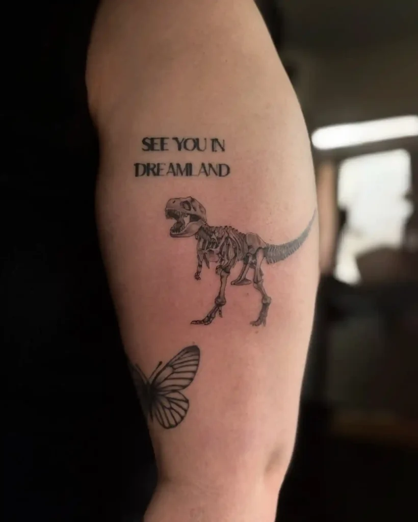 “See You in Dreamland” Dinosaur Skeleton Tattoo
