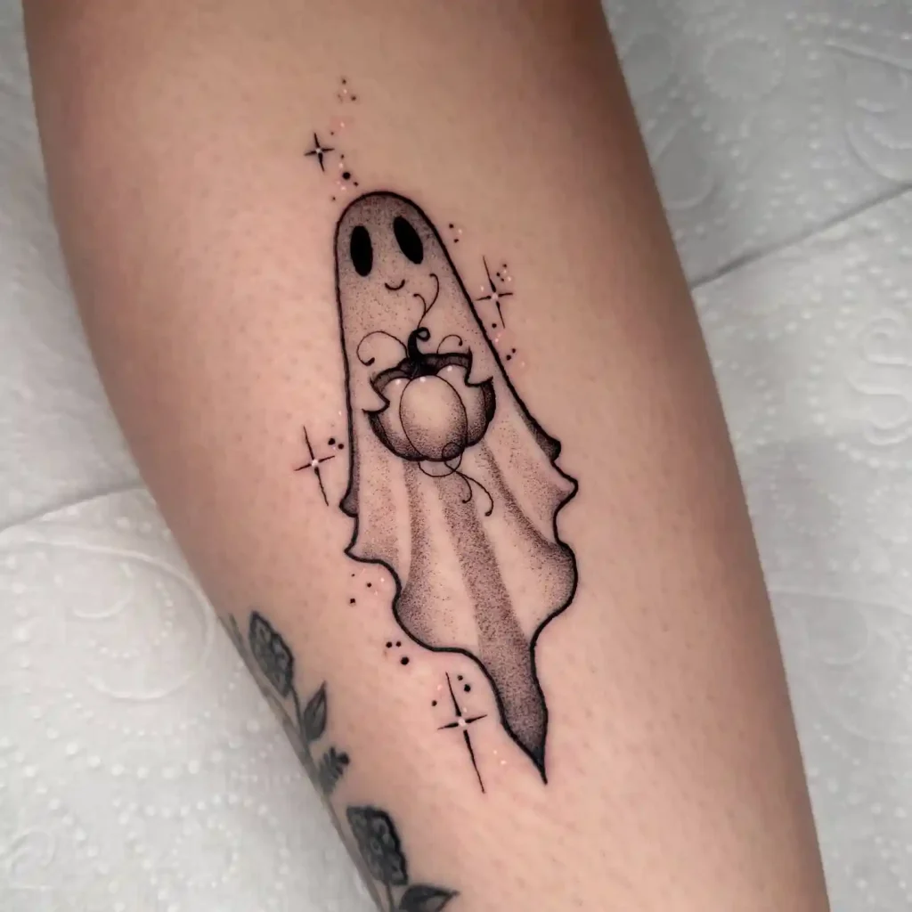 Whimsical Ghost Holding Pumpkin Tattoo