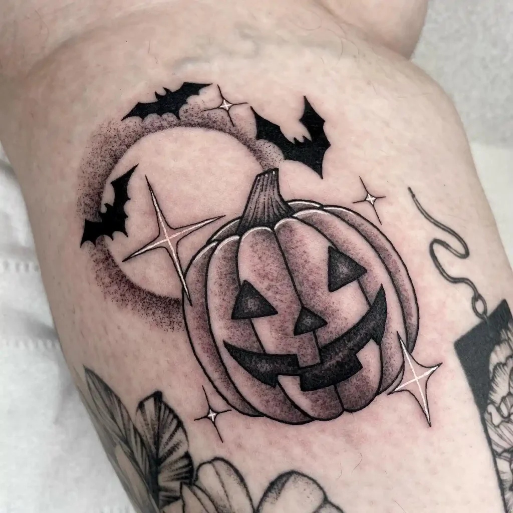 Moon and Smiling Pumpkin Tattoo