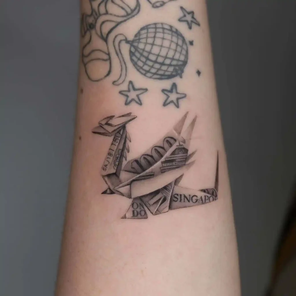 Money Currency Note Origami Dragon on Forearm