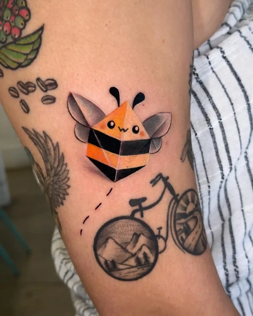 Kawaii Origami Bee Tattoo on Upper Arm