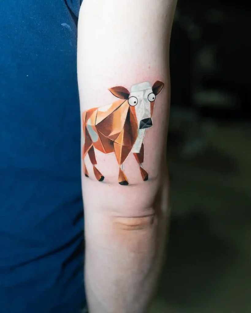 Papercraft Origami Cow Tattoo on Upper Arm