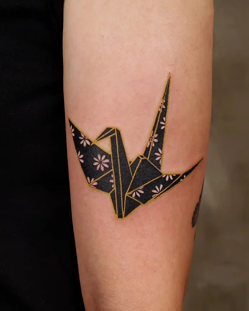 Gilded Paper Crane on Inner Arm