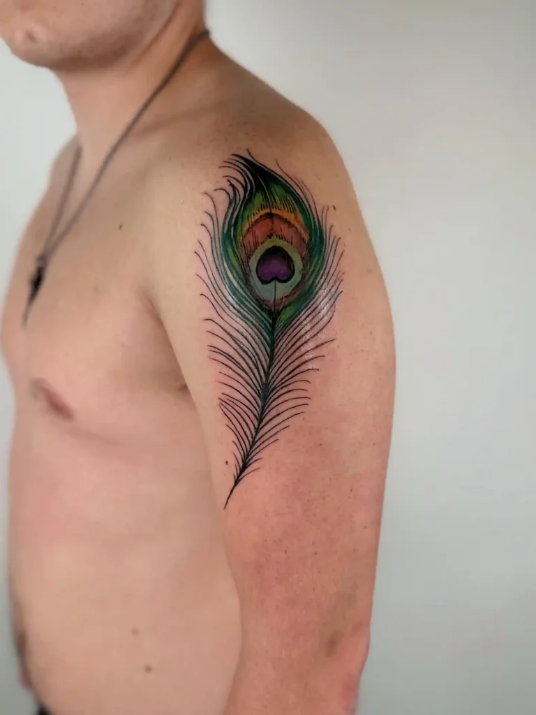 Vibrant Peacock Feather Tattoo