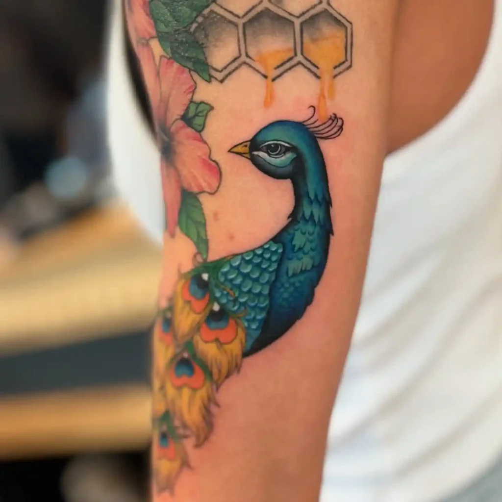 Elegant Peacock Portrait Tattoo