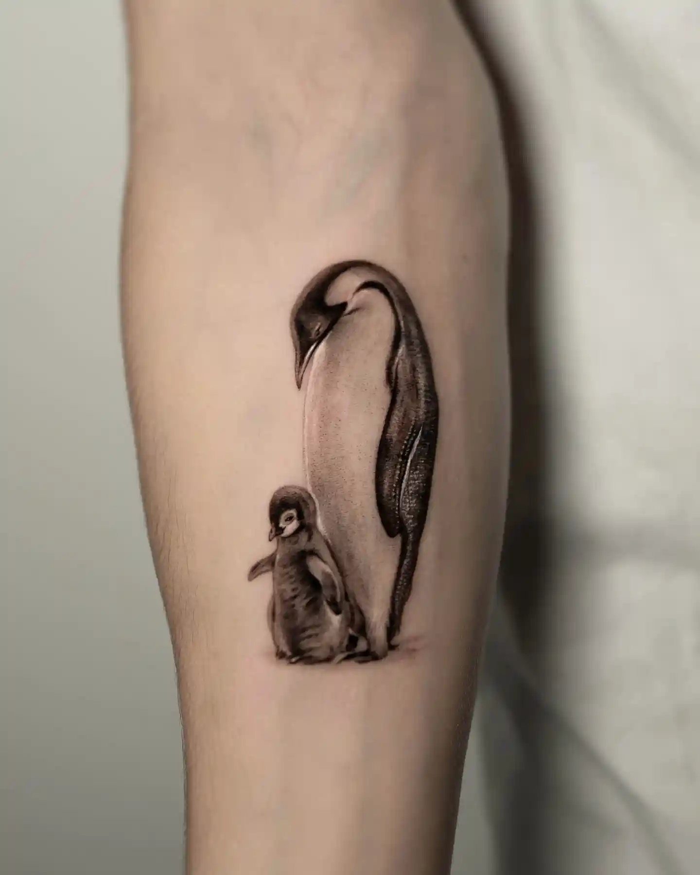 Protective Penguin with Chick Tattoo