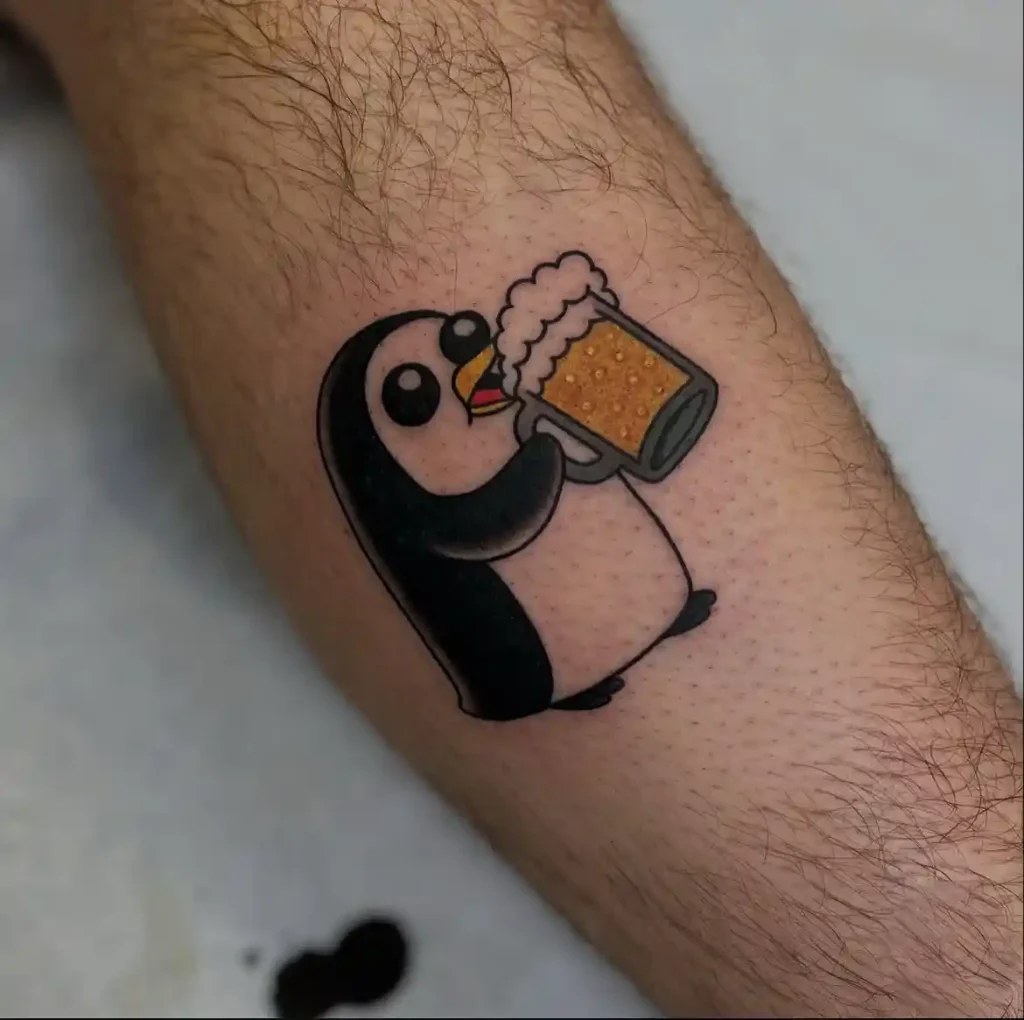 Gunter the Penguin Enjoying a Beer Tattoo