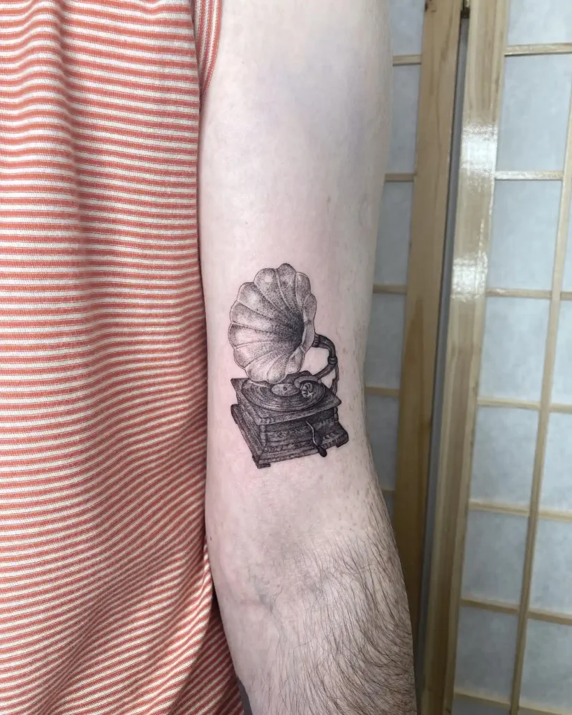Delicate & Realistic Gramophone Tattoo