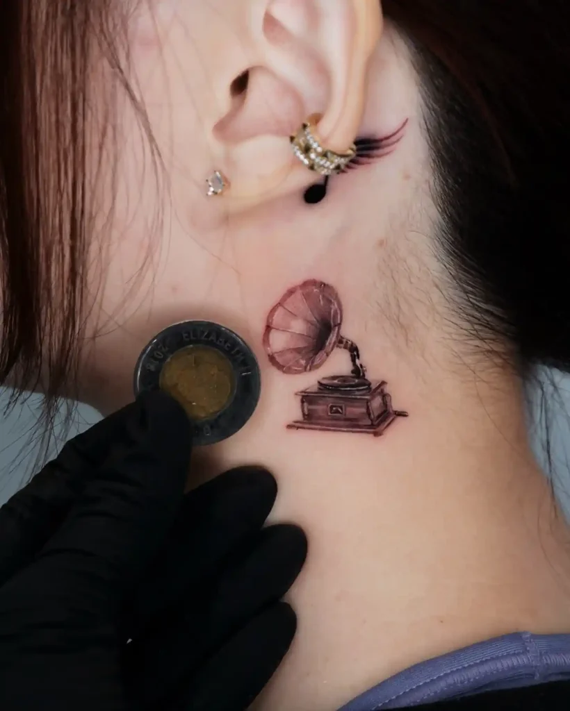 Tiny Behind The Ear Gramophone Tattoo