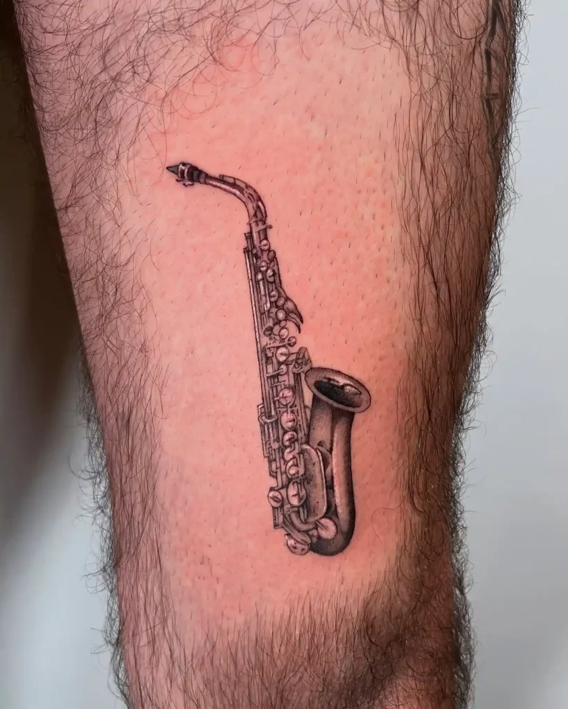 Realistic Saxophone Tattoo