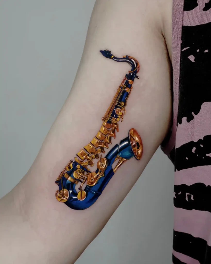 Realistic Blue and Gold Saxophone Tattoo