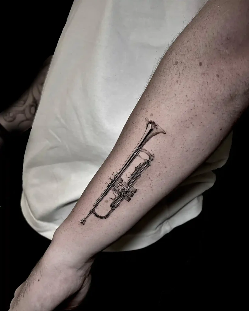 Realistic Black and Grey Trumpet Tattoo