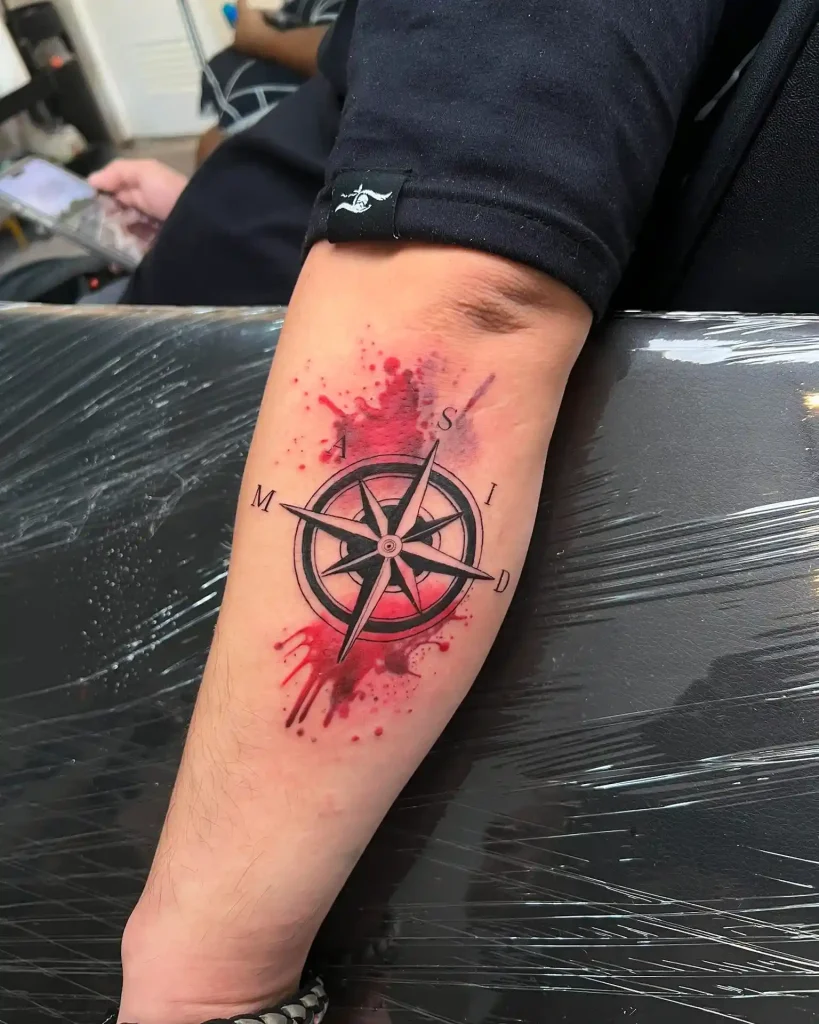Abstract Red Splash Compass on Forearm