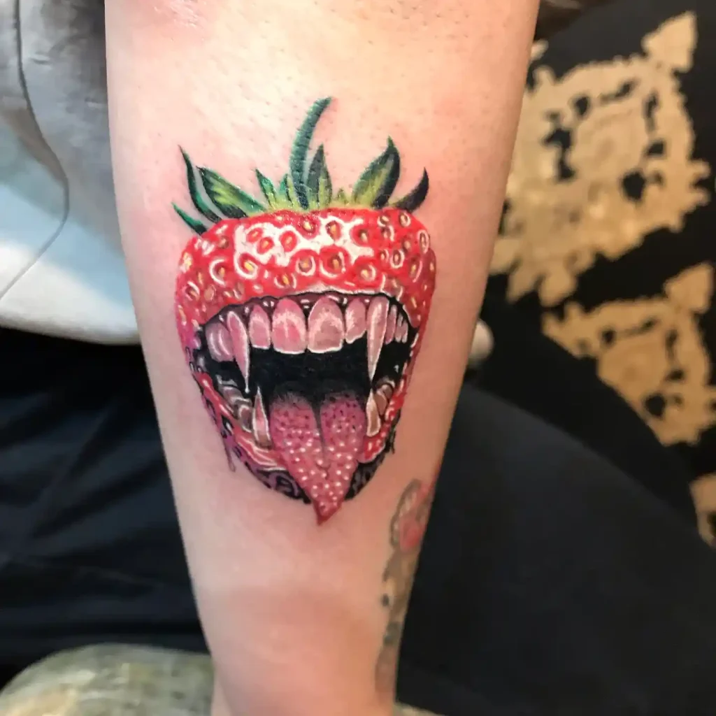 Fierce Strawberry Mouth Tattoo on Forearm