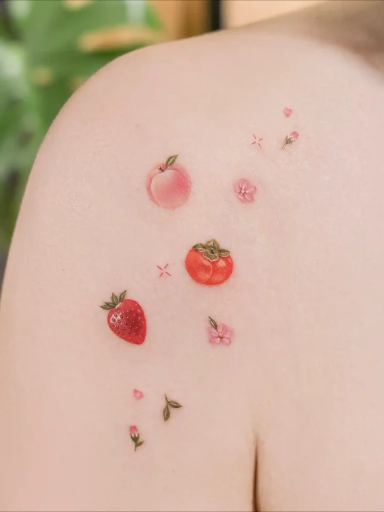 Fruit-Themed Mini Tattoo Collection on Shoulder