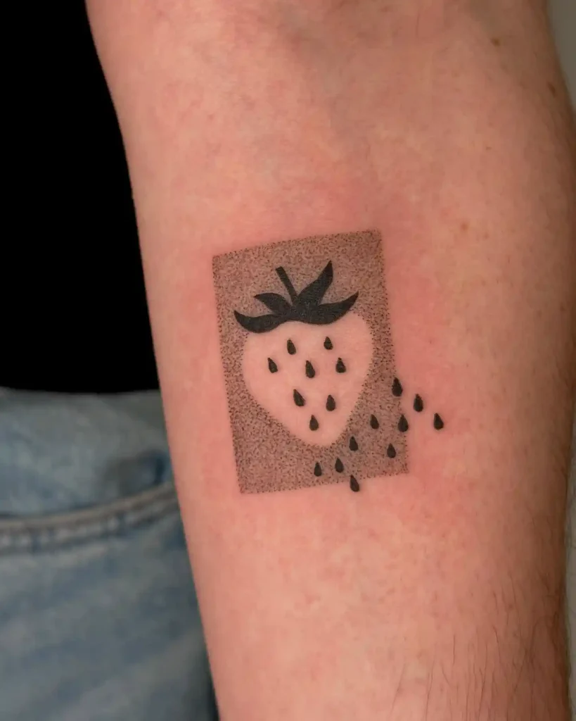 Negative Space Strawberry Tattoo on Forearm