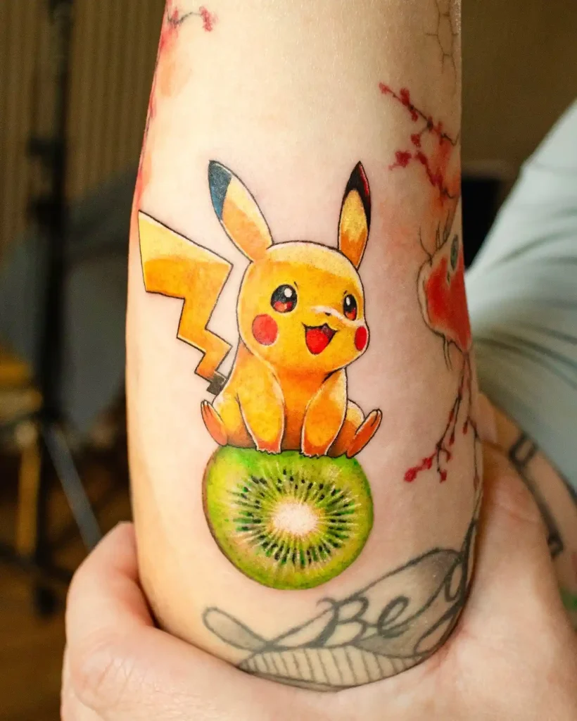 Pikachu Sitting on a Kiwi Slice on Arm