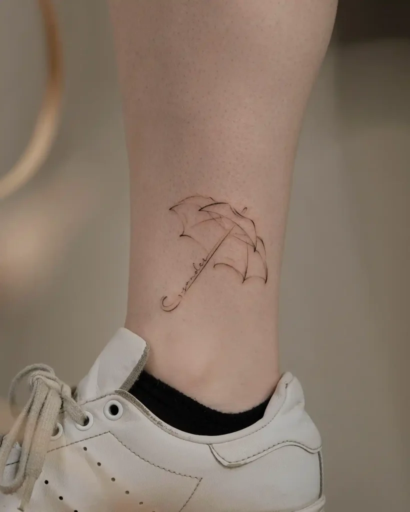 Fine Line Wander Script Umbrella on Ankle
