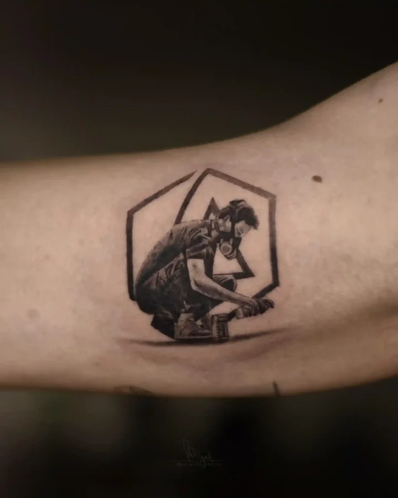 Framed Spray Painter on Inner Bicep