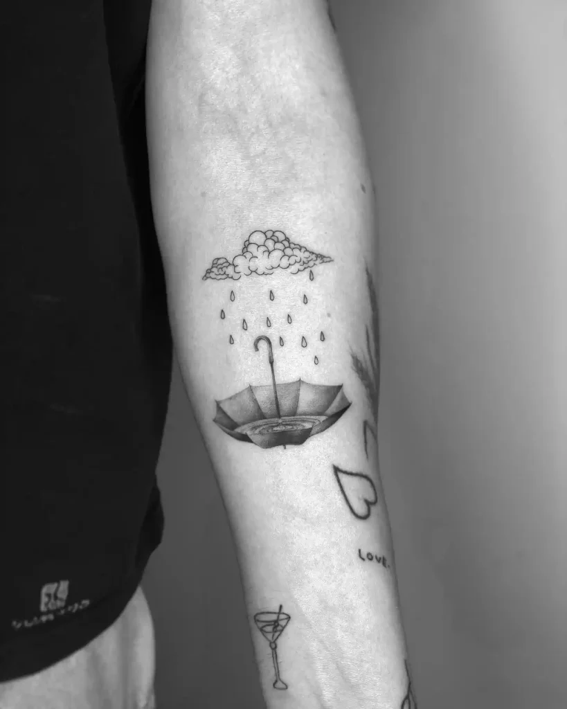 Inverted Umbrella Catching Rain on Forearm