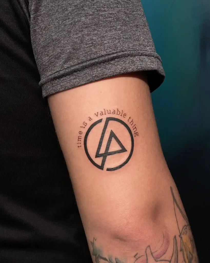 Lyric and Logo Tribute on Back of Arm