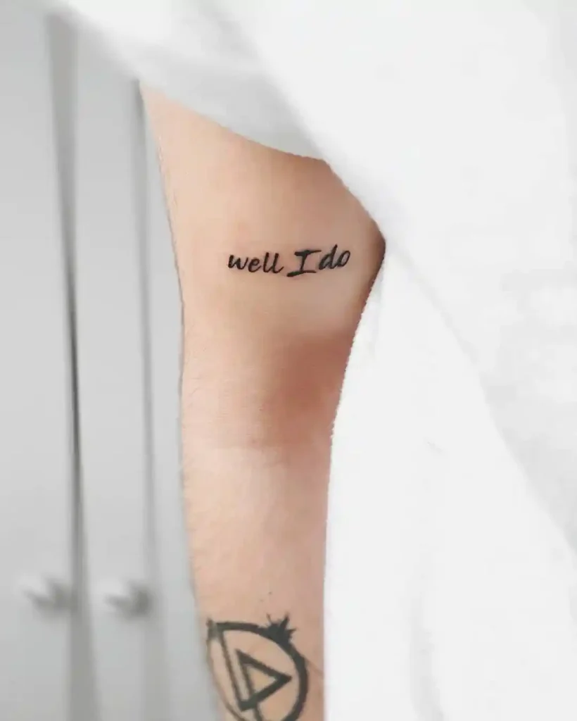 Minimalist Lyric Quote on Inner Bicep