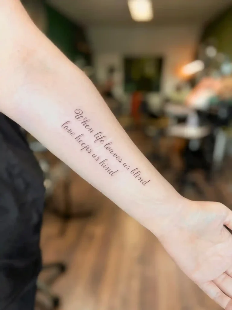Script Lyrics on Inner Forearm