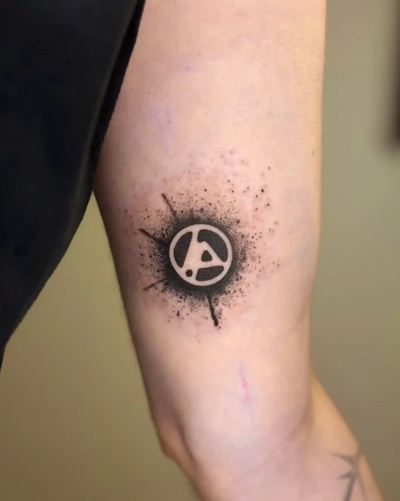 Splatter Effect Logo on Inner Bicep