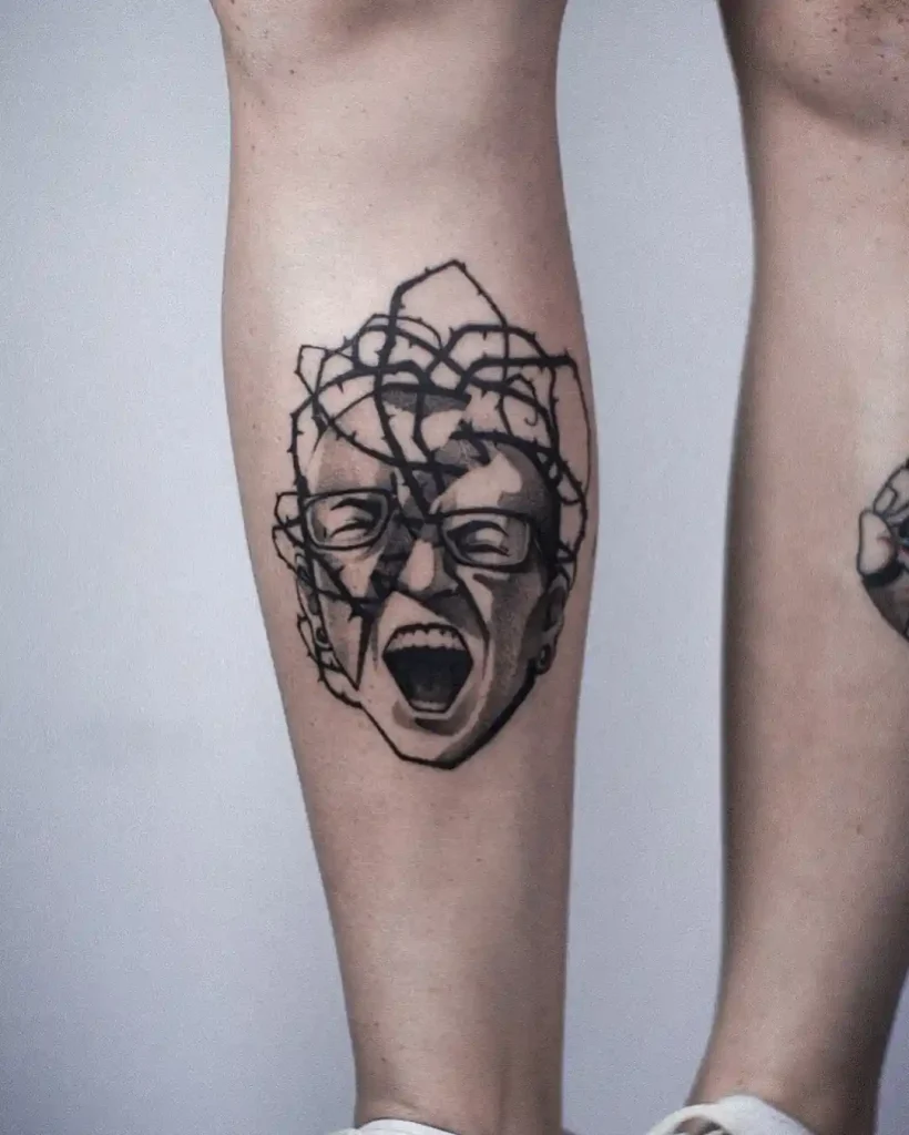 Stylized Scream with Thorns on Calf